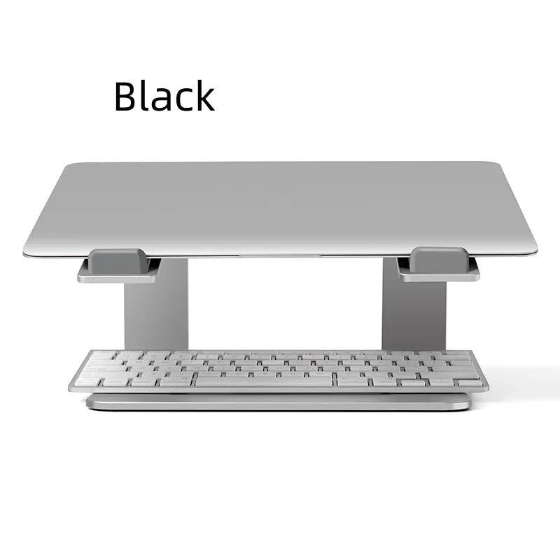 Black aluminium alloy laptop stand folded on desk next to silver version