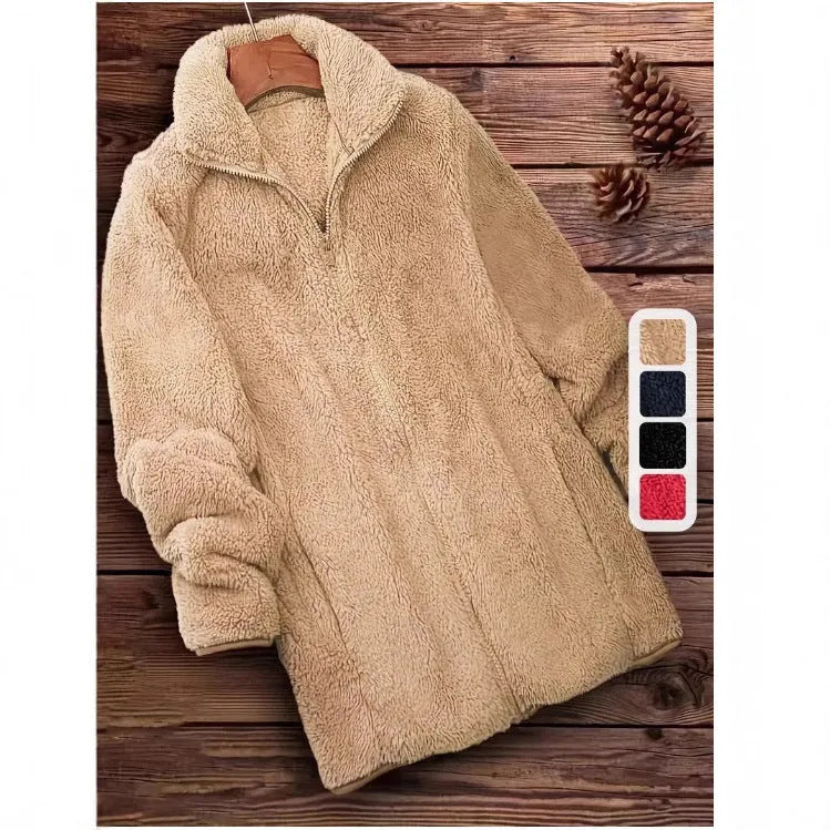 Double-sided fleece jacket in black, navy blue, or khaki colour on a hanger.