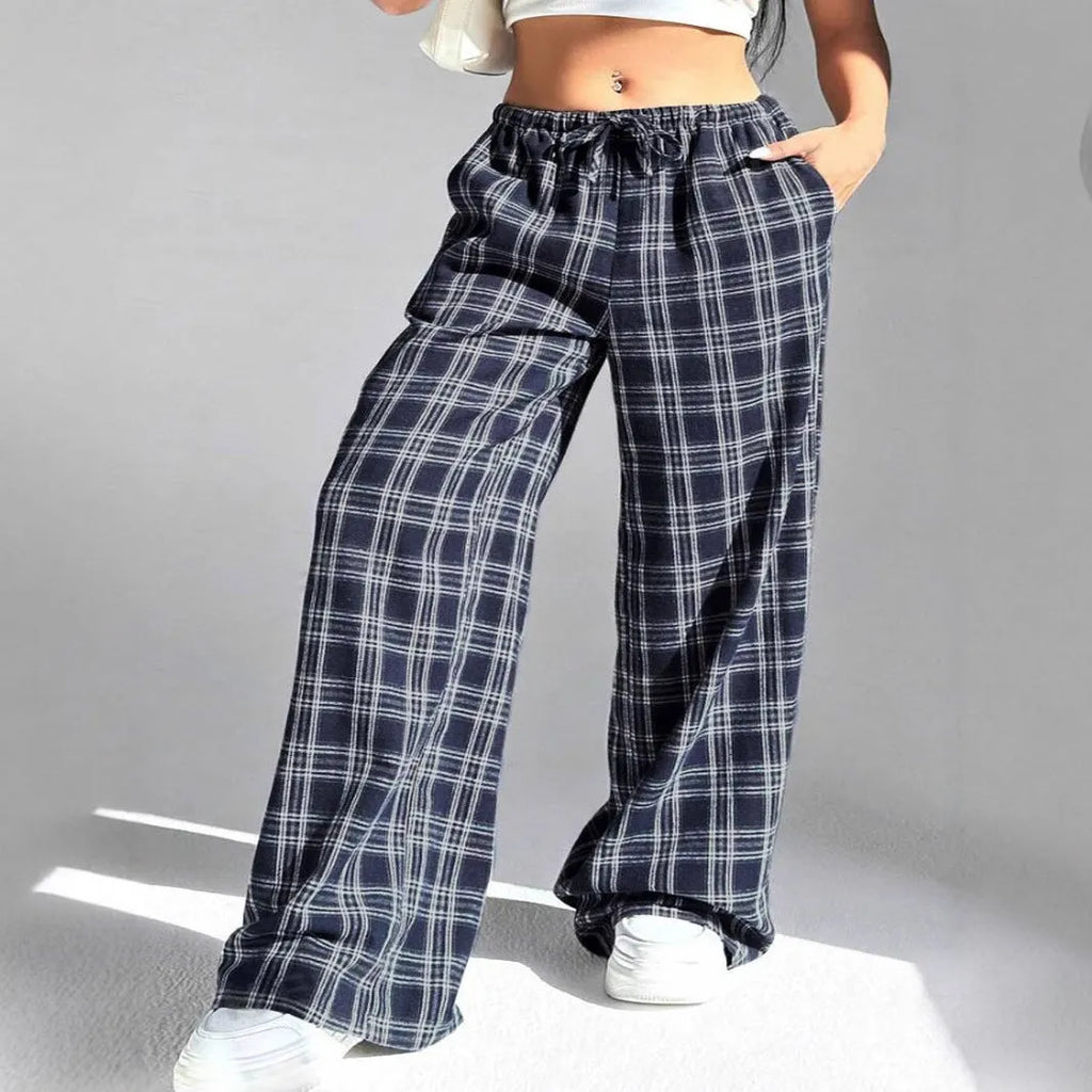 Women's plaid trousers with drawstring waist and front pockets in red colour