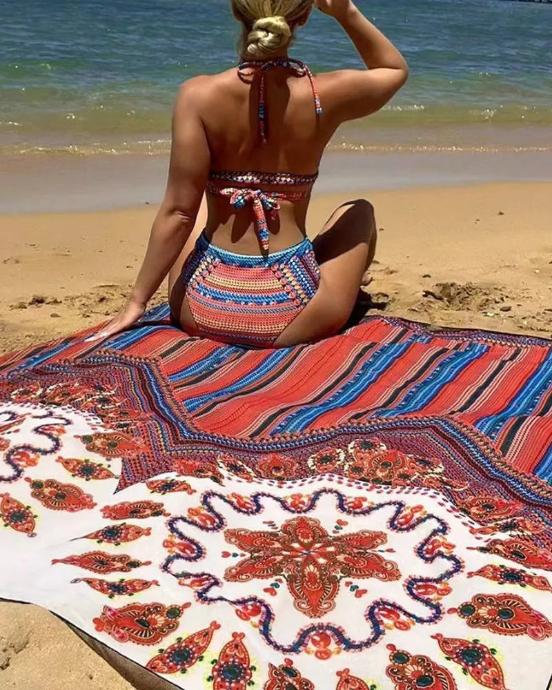 Women's three-piece swimsuit set showing high-waist briefs, cutout sleeveless top and matching coat in picture colour