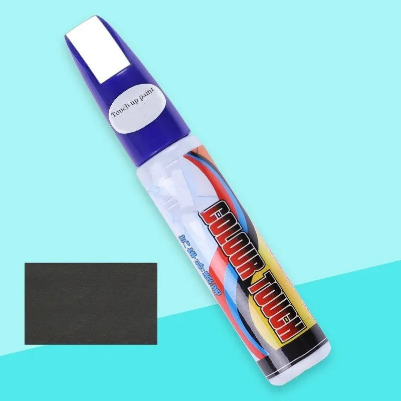 Automotive scratch repair kit with paint pen, wax tube, sponge, and sandpaper for DIY car paint touch-up.