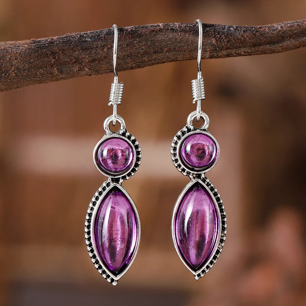 Vintage geometric bohemian earrings with electroplated black and purple finish