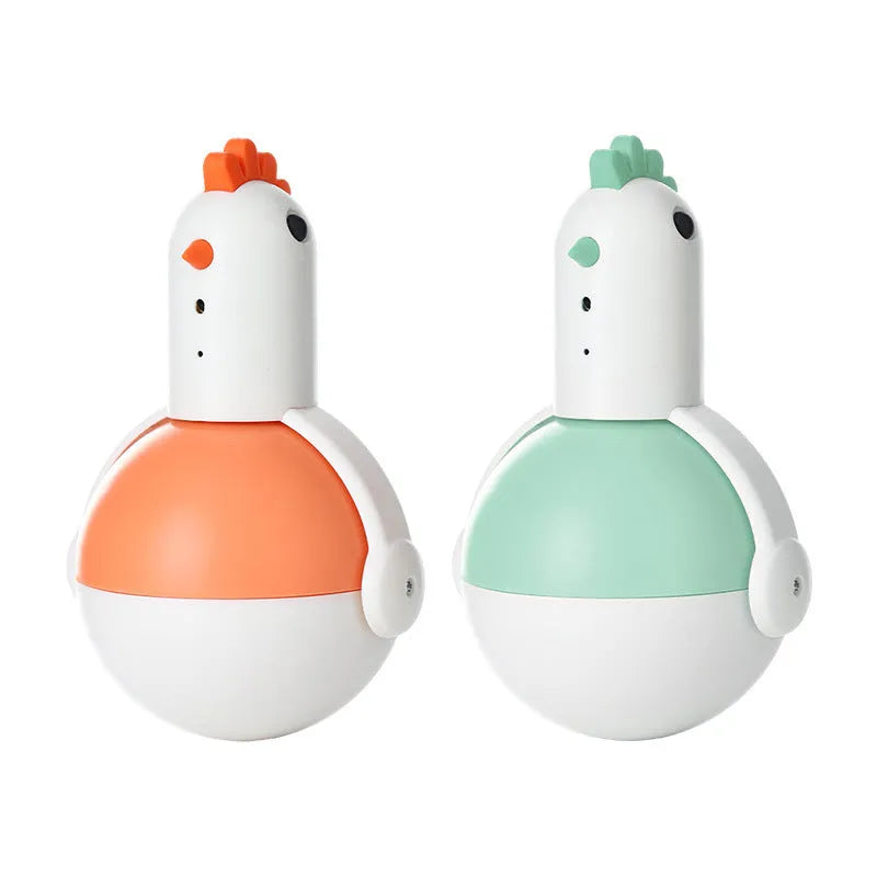 Green or orange electric chicken cat toy with laser light and sound functions on a flat surface