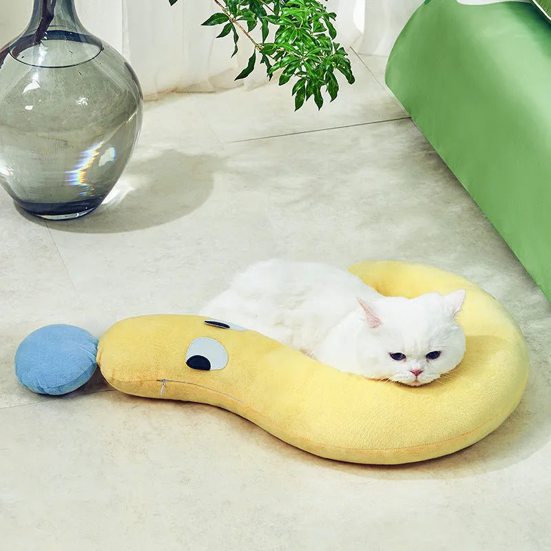 Blue rectangular cat and dog pillow cushion on a floor, dimensions 62 cm by 39 cm.