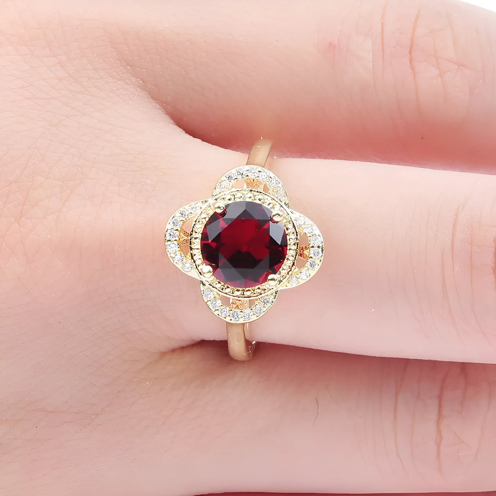 Copper ring with a fruit-shaped zircon stone inlaid, shown in UK size 7, 8, or 9.