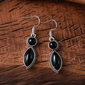Vintage geometric bohemian earrings with electroplated black and purple finish