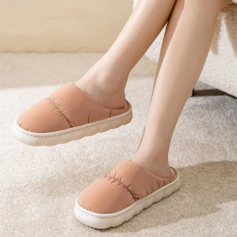 Down cotton slippers with artificial leather upper, rubber sole and plush lining in multiple colours