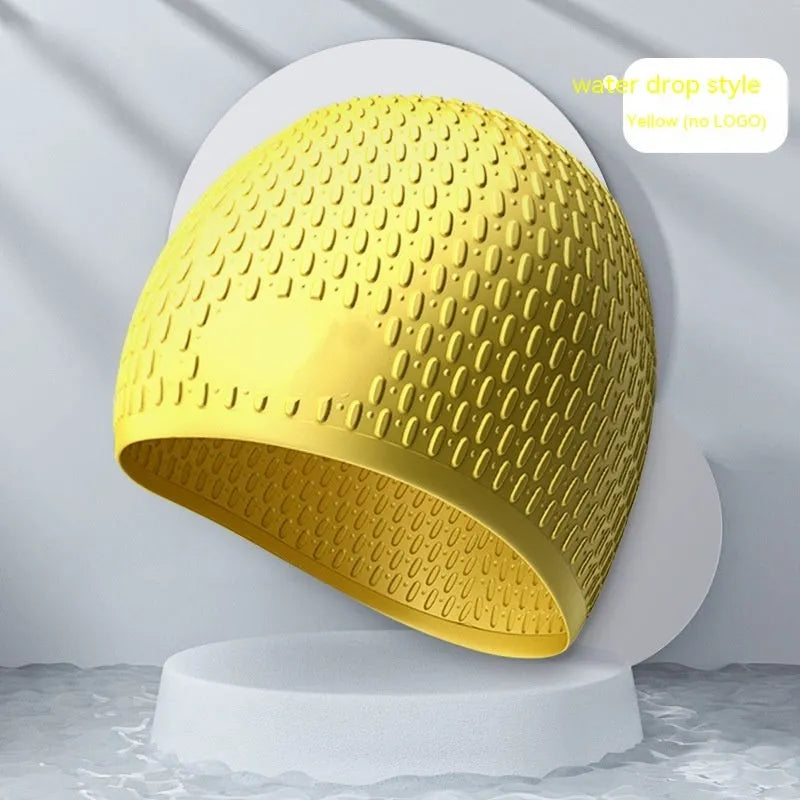 Silicone swimming cap for adults in various solid colours on a white background.
