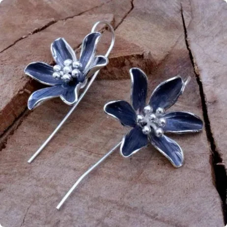 Purple flower-shaped alloy earrings with electroplated finish and butterfly clasps