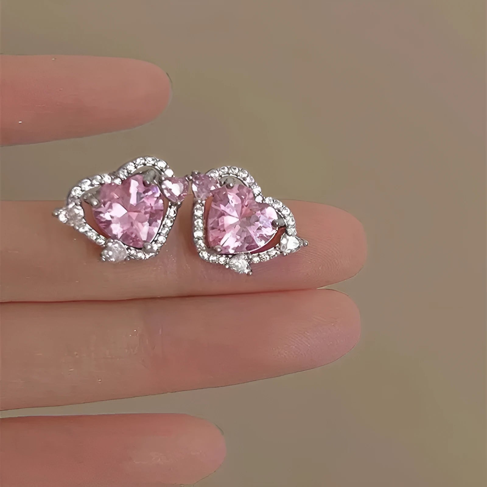 Guardian Heart white K gold tone electroplated copper stud earrings with heart shape design