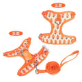 Reflective vest-style dog harness for small breeds in carrot orange colour with hand-holding rope