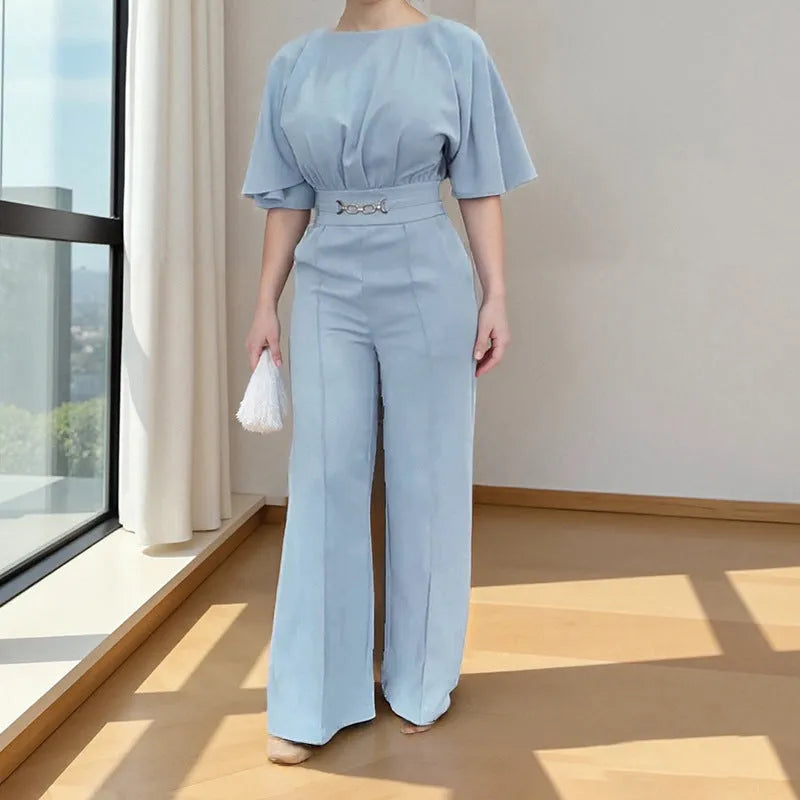 Blue men's polyester suit with trousers and long-sleeved shirt on hanger