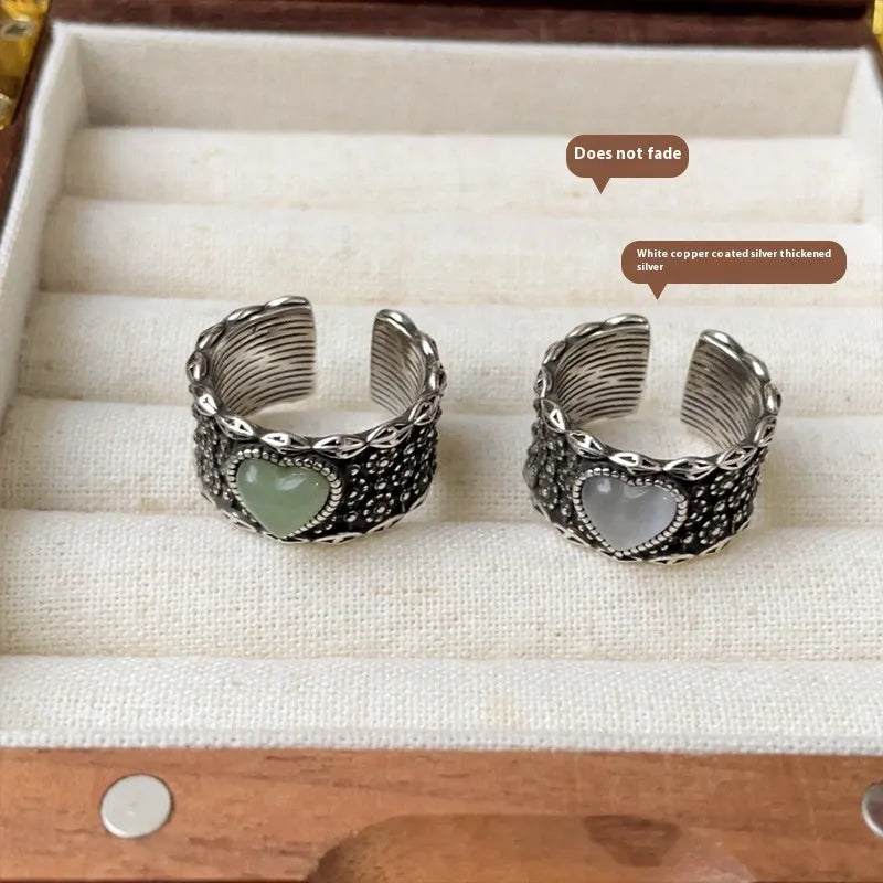 Retro wide-faced adjustable heart ring in white copper plated silver with open design