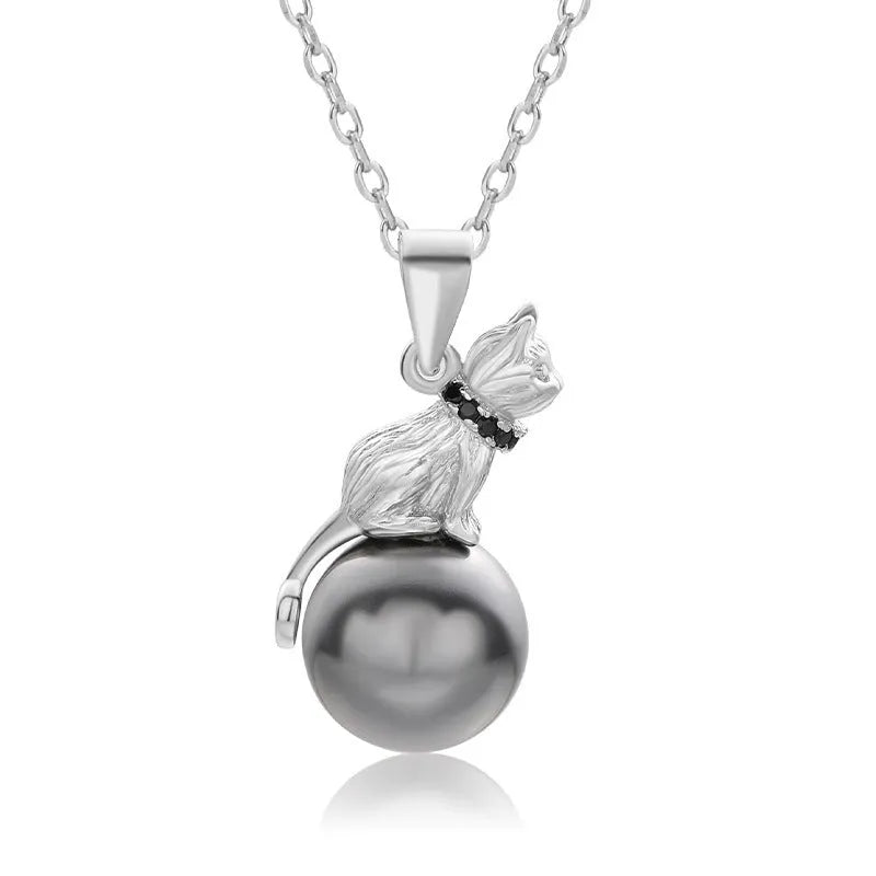 925 sterling silver cat pendant necklace with electroplated finish on model