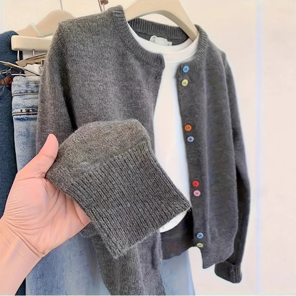 Dark grey women's polyester cardigan sweater with button front and long sleeves laid flat.