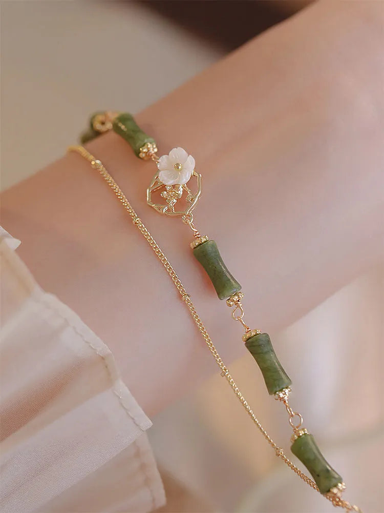 Handmade natural olivine bracelet with double layer Twin Bells of Ireland design and olive branch elements