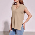 Women's camel coloured V-neck sleeveless pullover vest with loose fit and folding details