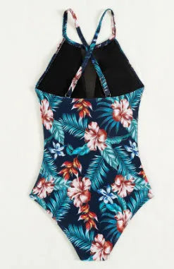 Women's deep V-neck one-piece swimsuit in a solid colour on a mannequin.