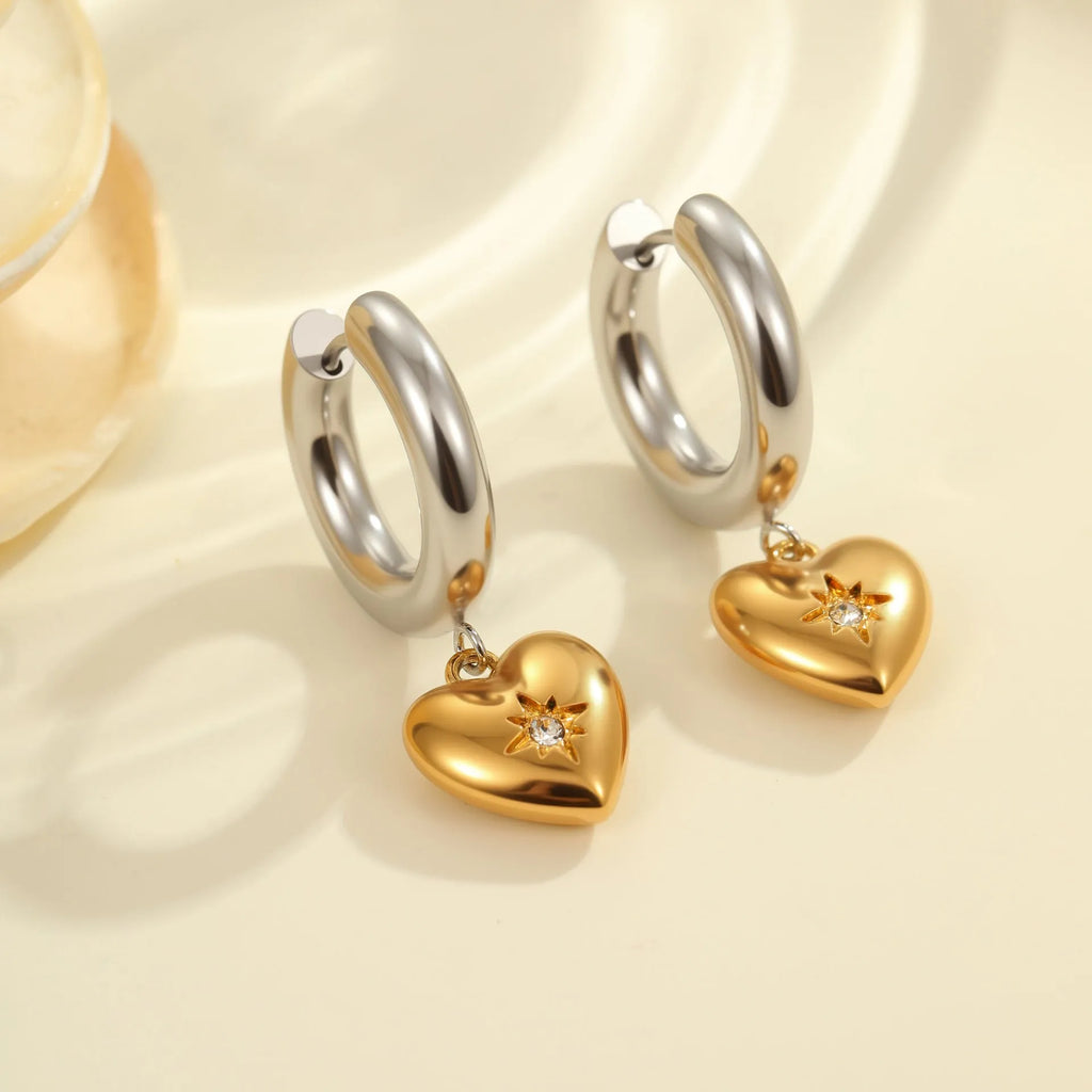 Women's stainless steel Christmas tree earrings with 18K electroplated finish showing heart and star shapes