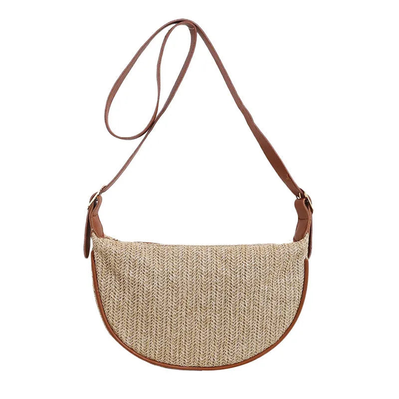 Women's woven straw crossbody bag with single strap and internal phone pocket