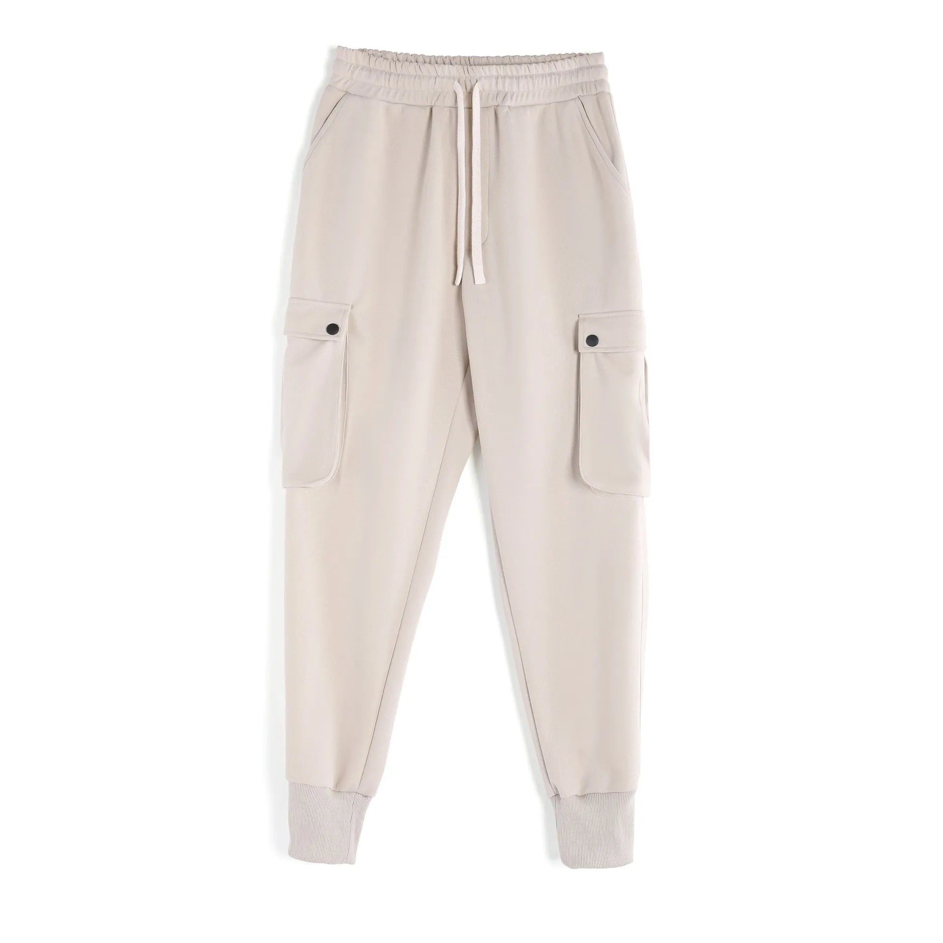 Men's loose light grey cotton sports trousers with ankle ties and multiple pockets laid flat.