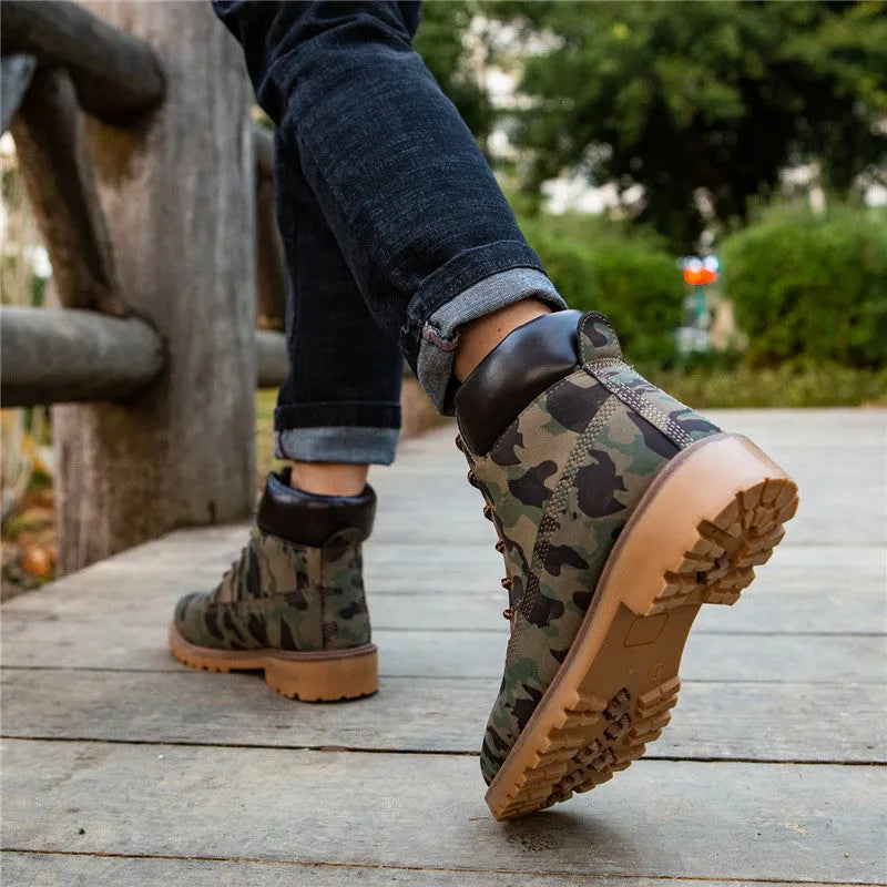 Men's pink Martin boots with velvet lining, flat sole, and round toe on a lace-up high-top.