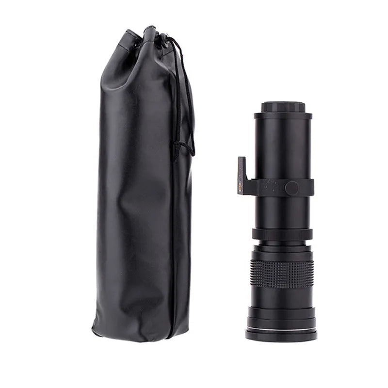Manual telephoto zoom camera lens adapter with 420-800mm range and 67mm filter thread on a black background.