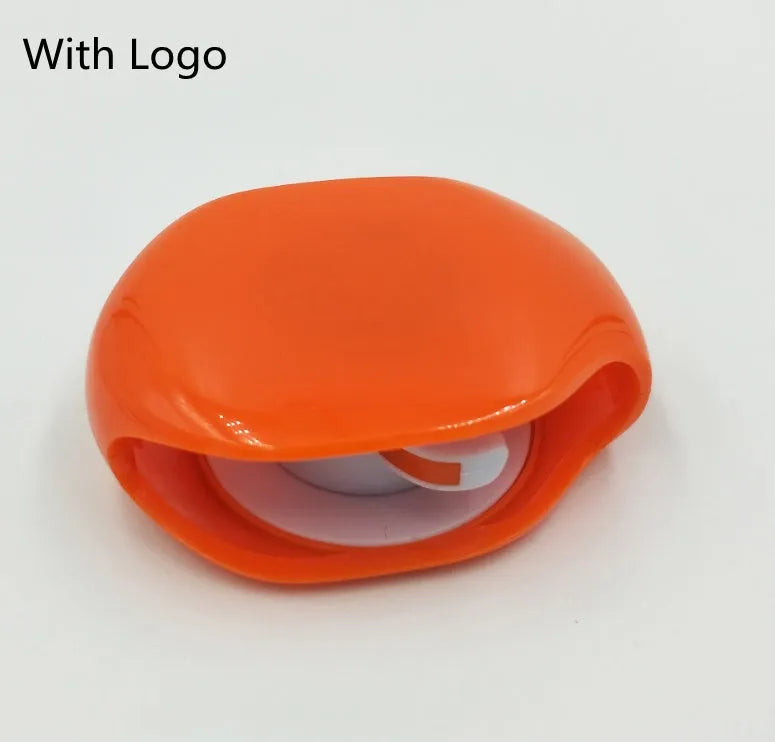 Automatic earphone cable winder with telescopic push mechanism showing compact design