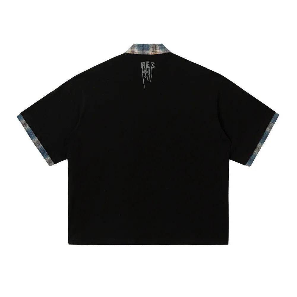 Men's loose fit short-sleeved top with graffiti print on asymmetric lapel in blue or red.