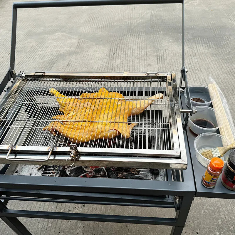 Large foldable portable charcoal BBQ grill oven for outdoor garden use.