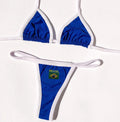 Women's blue T-back bikini top with matching shorts-style bottoms on a neutral background.