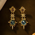 Gold geometric round stud earrings with retro court style design