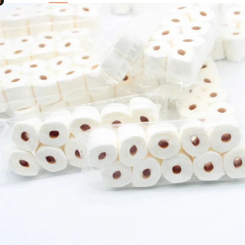 Miniature white paper tissue roll model for dollhouse display