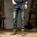Man wearing retro blue skinny fit stretch denim jeans with a zip fly.