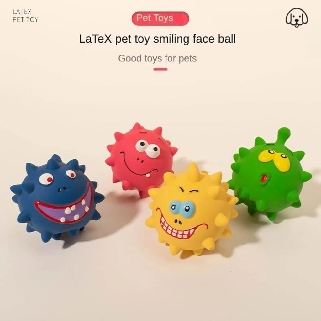 Set of four coloured latex squeaky dog balls with cute faces on a blue background