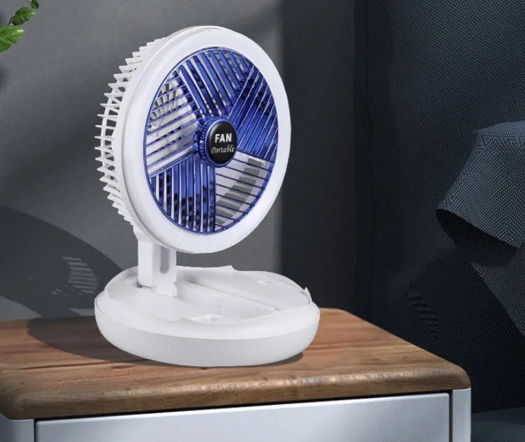 Blue foldable USB desk fan with LED light showing wall mounting bracket and pen holder