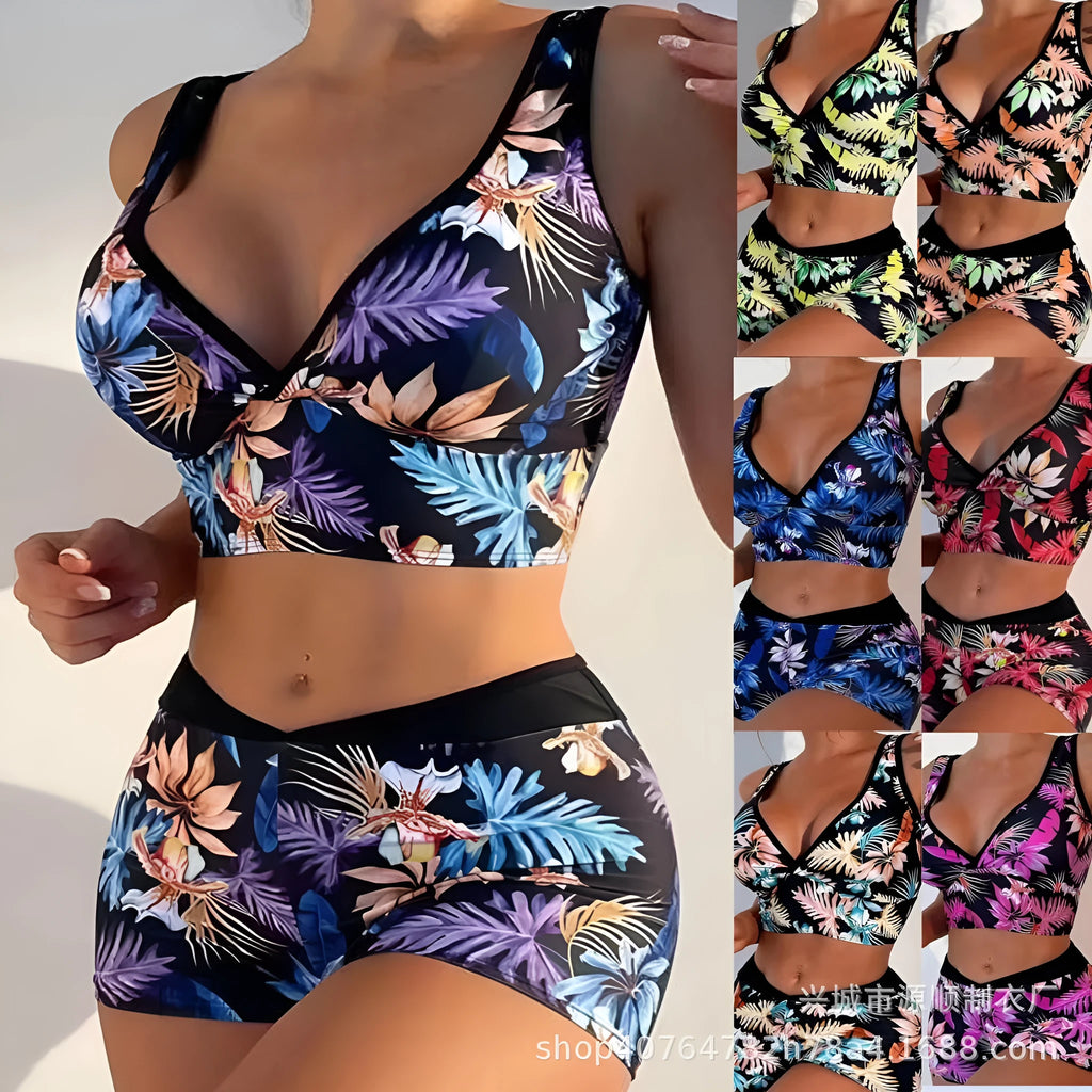 Women's two-piece swimsuit set with printed boxer briefs and sleeveless top on a hanger.