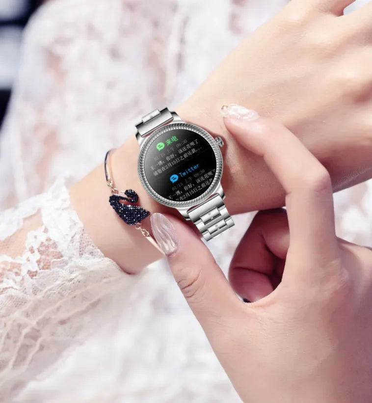 AK38 ladies smart watch with TFT screen and stainless steel Milanese bracelet on wrist