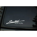 Reflective flexible plastic bumper sticker for cars, shown in black, white, and colourful design options.