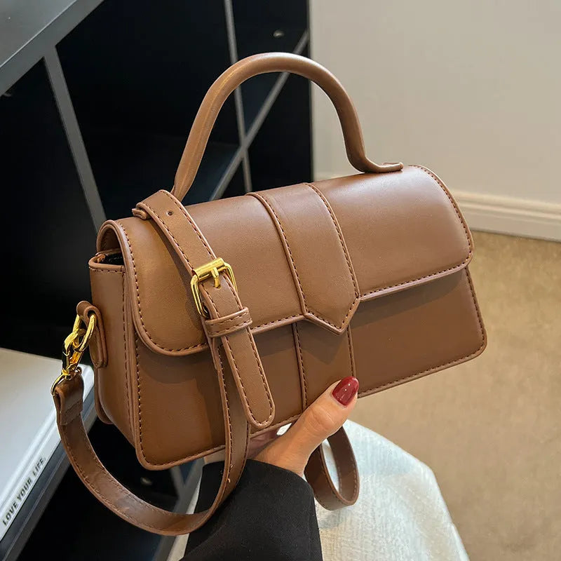 Women's brown PU leather messenger bag with horizontal square design showing sandwich pocket