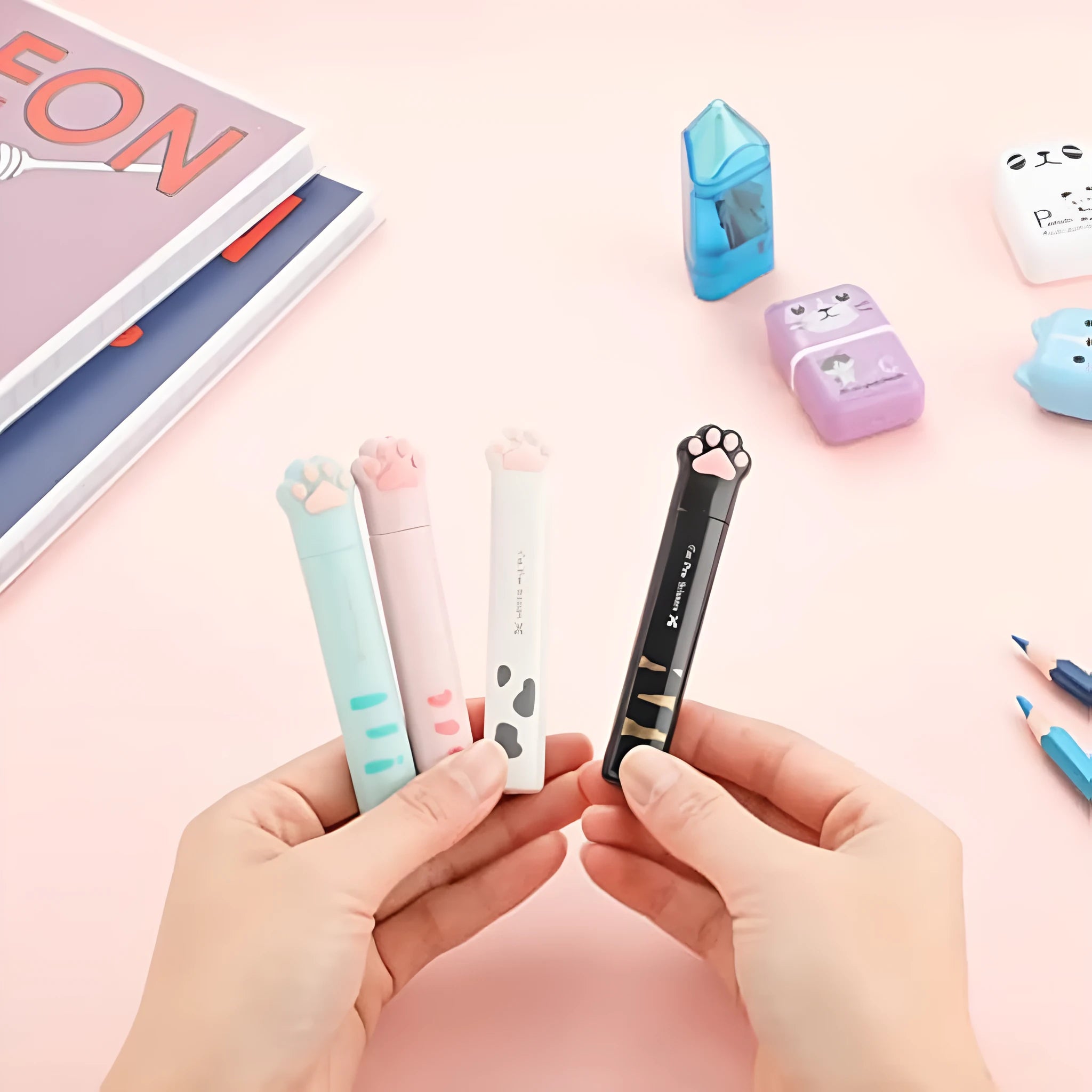 Cat paw mini folding safety scissors showing stainless steel blades and decorative handles in four colour options