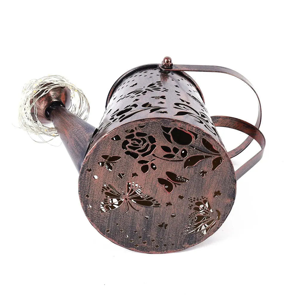 Solar garden lamp with butterfly pattern design and iron construction for outdoor lighting