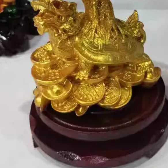 Citrine-coloured resin Feng Shui ornament with small water turtle and money tree design measuring 18x11x23cm