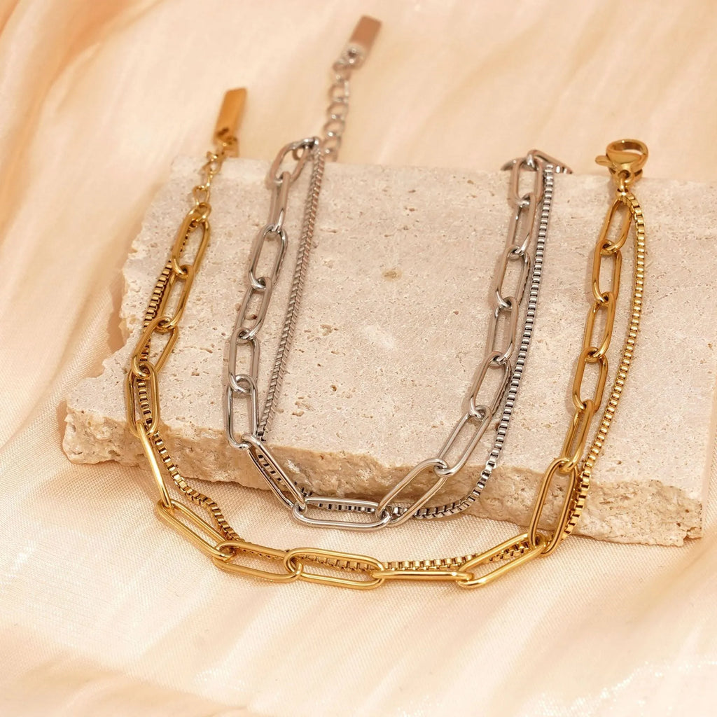 Double layer twin titanium steel bracelet in gold or silver colour with geometric line design