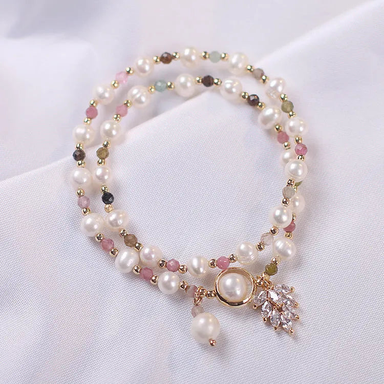 Women's double layer crystal bracelet with red cat's eye flowers and lucky cat charm in fairy style design