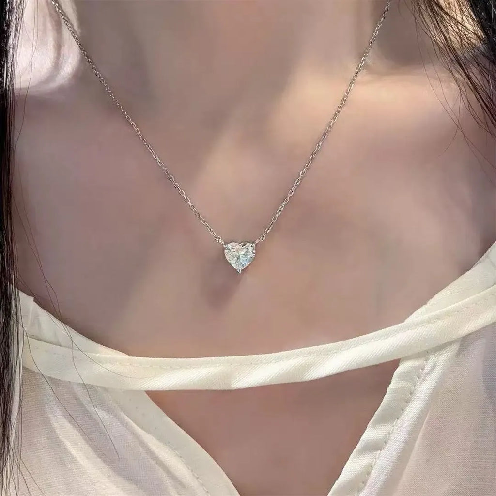 Women's copper necklace with heart-shaped pendant and polished silver finish