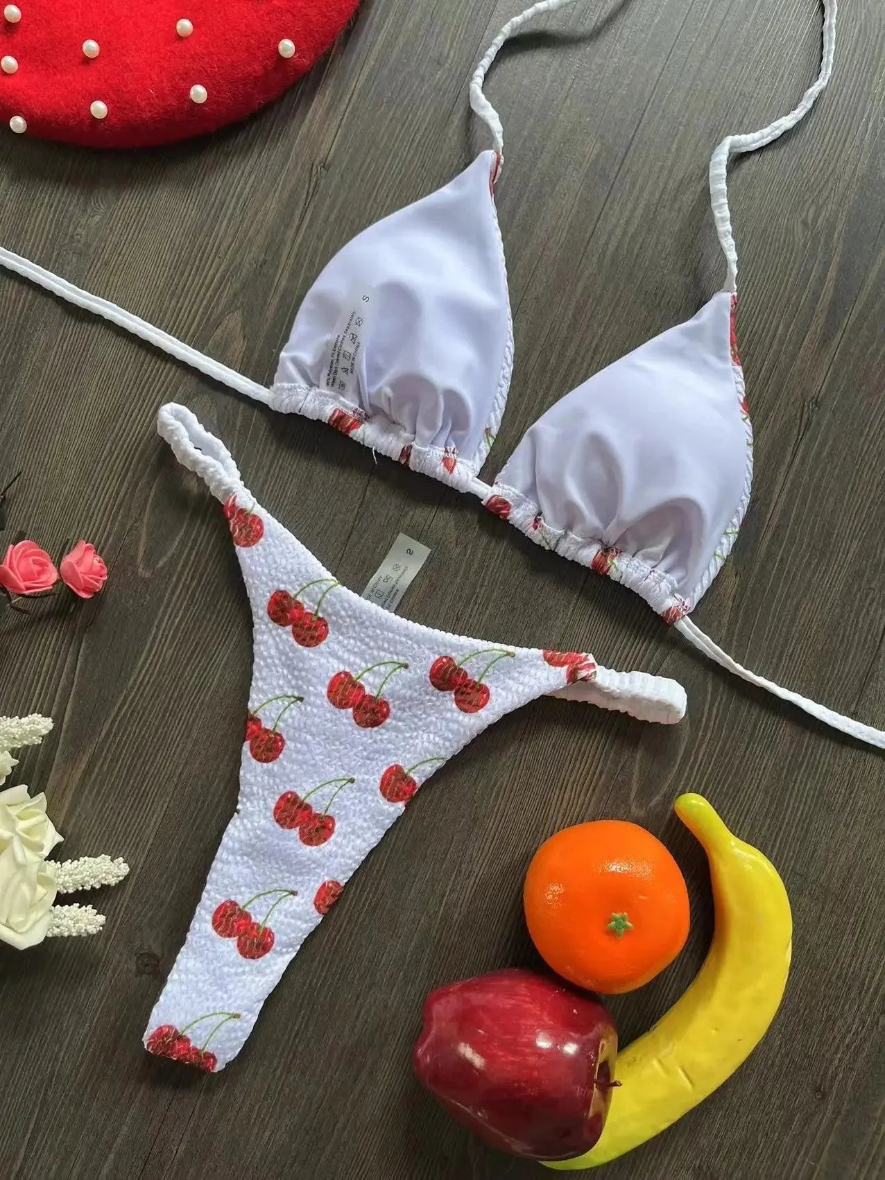 Women's printed beach bikini swimsuit with cotton lining on mannequin