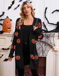 Women's black Halloween cardigan with orange pumpkin head jacquard pattern, shown as a straight-cut medium-length knit.