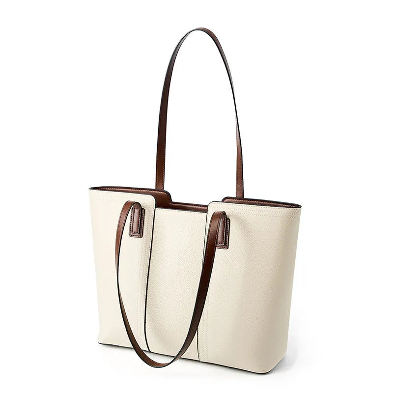 Women's black genuine leather crossbody shoulder bag with horizontal square shape and multiple internal compartments