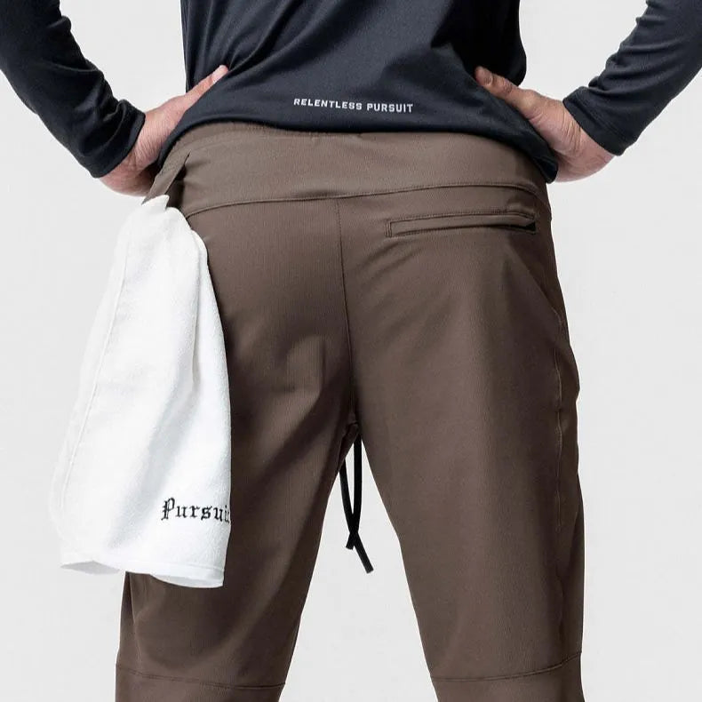 Men's ankle-tied loose casual fitness trousers in quick-drying polyester blend fabric